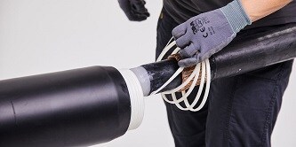 Bild som visar tillämpning av strömkablar med kallkrympningsteknik
