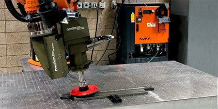 Slipning av svetsfogar med robotarm
