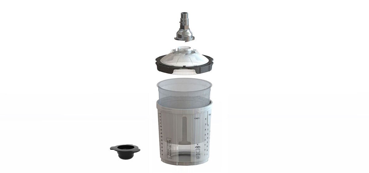 komponenter i 3M PPS Series 2.0 Spray Cup System mot en vit bakgrund
