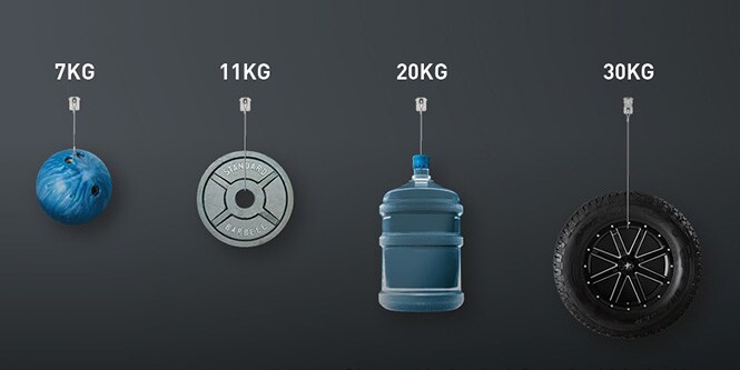 Fyra olika objekt, var och en märkt med sina respektive vikter: 7 kg, 11 kg, 20 kg, 30 kg
